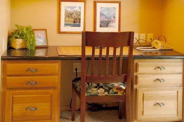 Built-in desk and cabinetry in a home office