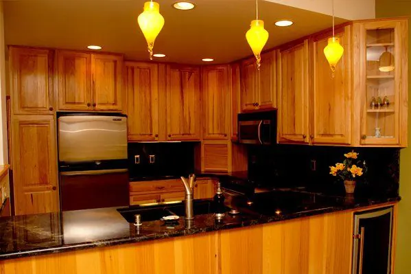Kitchen with granite counters and custom cabinetry